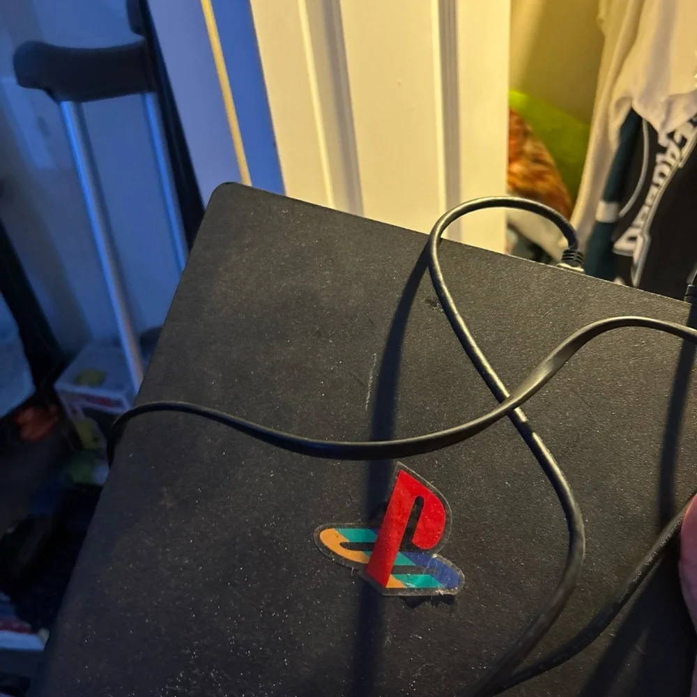 Sony PlayStation 4 Console in Black with Multicolor Logo